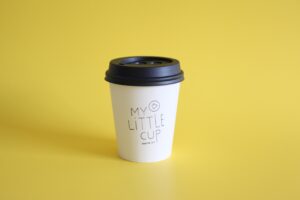Coffee Cup in a Yellow Background